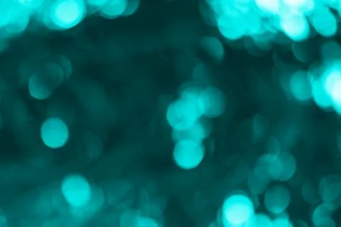 Subtle teal bokeh creating a magical, dreamlike atmosphere, perfect for bac.. Stock Photos