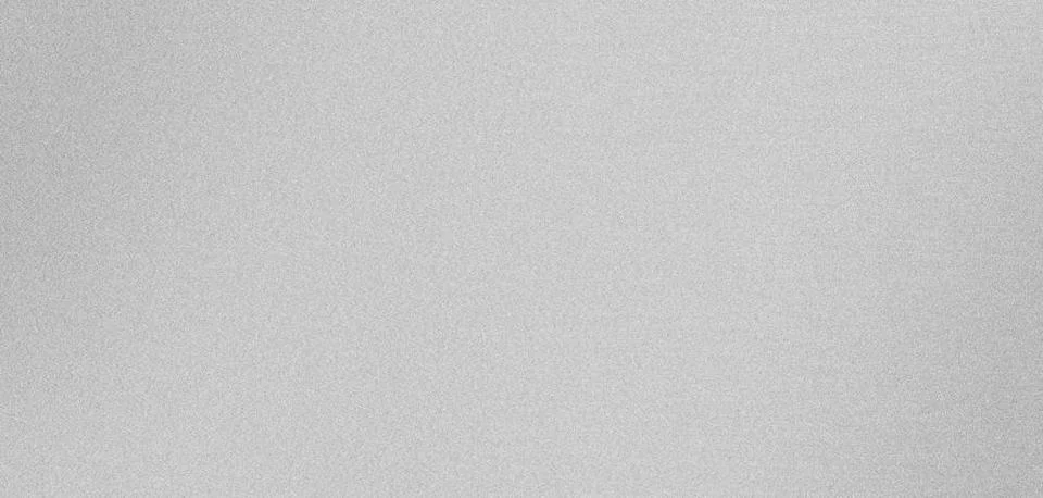 Subtle textured effect created by a grainy silver background Silver backgr... Foto stock