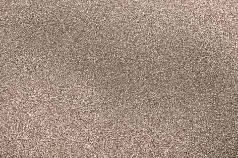 Subtle textured surface in a neutral Mocha and Mousse inspired color palette Stock Photos