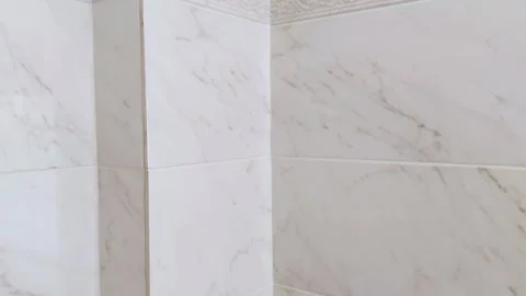 Subtle Tile Window for Hidden Plumbing: Neat and Quiet Access Stock Footage 312866683