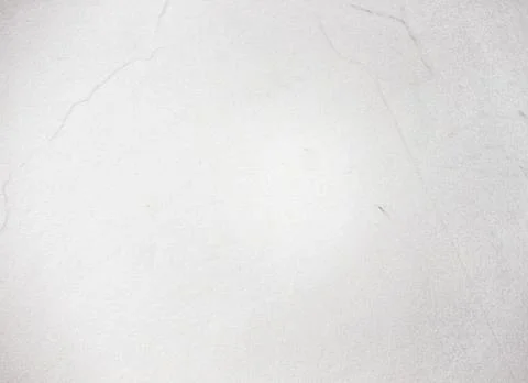 A subtle white marble texture features delicate veining and patterns creating Stockfoto's
