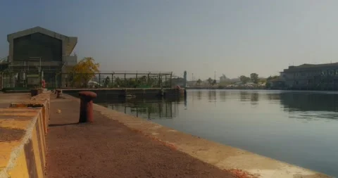 Suburb Dock View In Front Of Clear Sky And Building In Summer Stock Footage 230915842