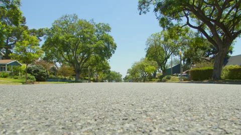 Suburban Empty Summer Street Low Angle Video stock 201626761