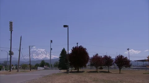 Suburban Field with Mount Rainier in Background Stock Footage 86755377
