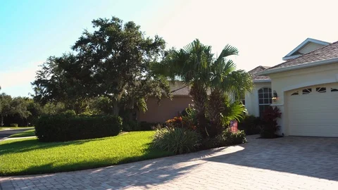 Suburban Florida house daytime exterior Stock Footage