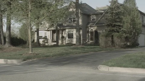 Suburban Home Pan Up Stock Footage 90366524