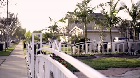 Suburban home on the sidewalk Stock Footage 49367373
