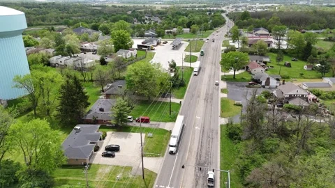 A suburban interchange - highways running through fields and wooded areas. Stock Footage 311772055