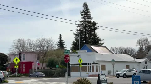 Suburban Intersection with Solar-Powered Buildings Stock Footage 266840867