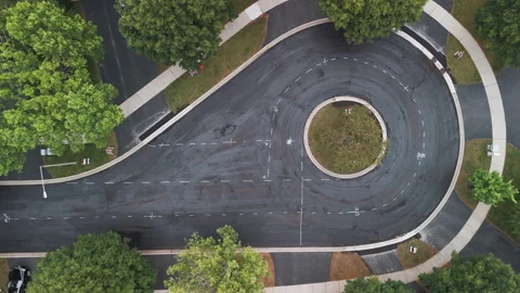 Suburban roadwork development new asphalt road and real estate houses. Aerial Stock Footage 296086685