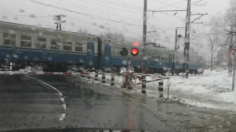 Suburban train movement through wet glass from rain Stock Footage 169466215