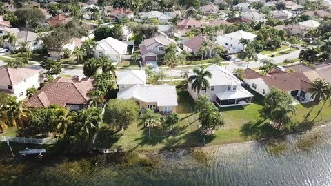 Suburban waterfront homes Stock Footage 101433989