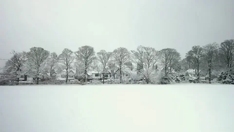Suburban winter scene, snowfall Stock Footage 83809183