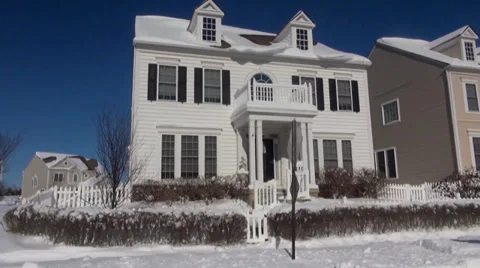 Suburbia homes in the snow Stock Footage 34335369