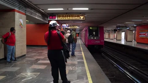 The subway arrives. Elderly fall down to the floor Stock Footage 133517960