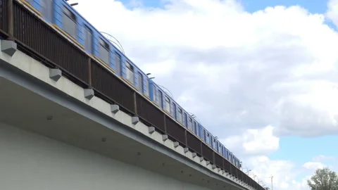 Subway car passes the overpass in 4K Stock Footage 154458544