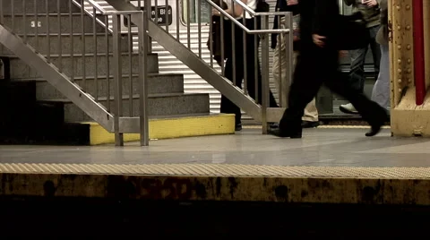 Subway Commuters getting off Train inside station Stock Footage 49223026