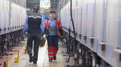 Subway Depot. Two Workers Underground go Towards Each Other Between Two Rolling Stock Footage 62283342