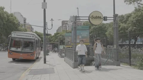 A subway exit in Buenos Aires, Argentina; a crowded street and people Stock-Footage 345139755