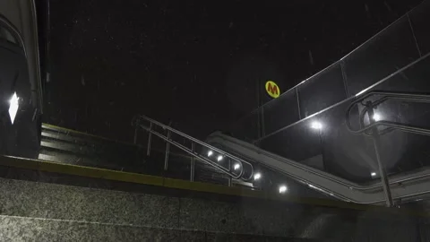 Subway exit on a snowy night Stock Footage 147895565