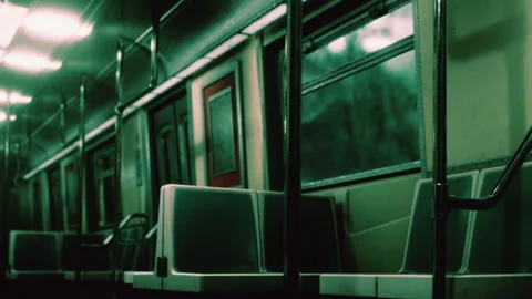 Subway interior shows empty seats and dim lighting during late hours Stock Footage 344992390