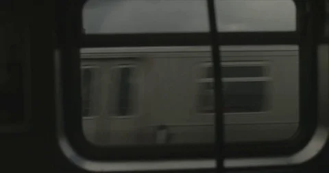 On a subway looking out the window at trains Stock Footage 76108249