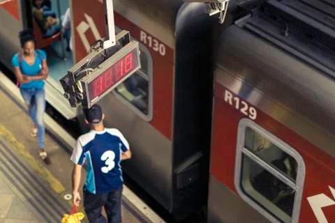 Subway passengers on light station platform, Sao Paulo, Brazil. Stock Photos