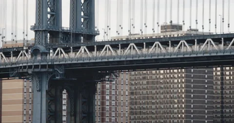 Subway passing over New York's Manhattan Bridge - 4k Stock Footage 67731993