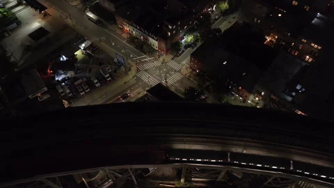 Subway passing through Brooklyn at night Stock Footage 253069174