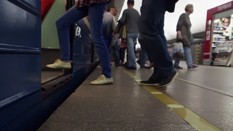 Subway, people go to the train. Close up Bottom view Stock Footage 128542766