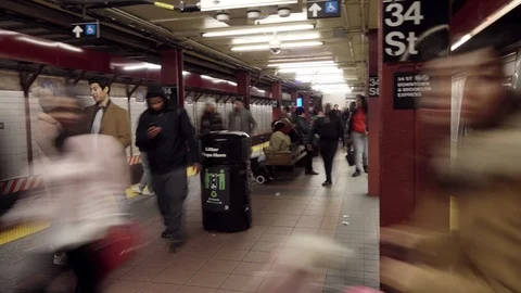 SUBWAY PLATFORM AT 34TH STREET - SLOW SHUTTER - HANDHELD Video stock 88551848