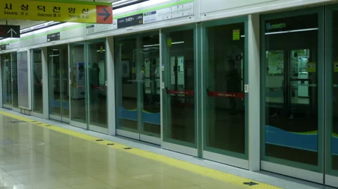 Subway platform screen door in korea Stock Footage 62843097