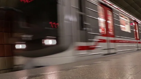 Subway in Prague with red and white stripes arriving at the station. Stock Footage 101981270