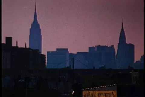 Subway pulling out of above ground station in New York Stock Footage 11357091