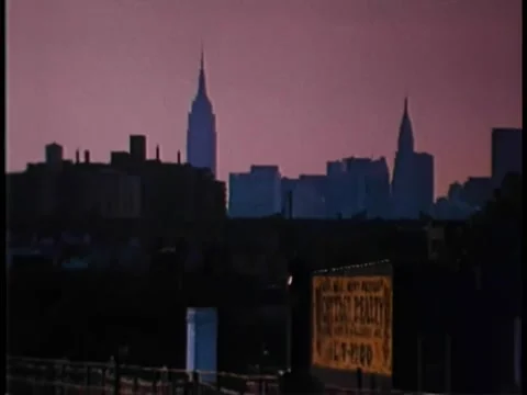Subway pulling out of above ground station in New York Stock Footage 260254415