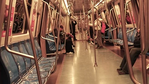 Subway ride in the city with empty seats and few passengers Stock Footage 327986185
