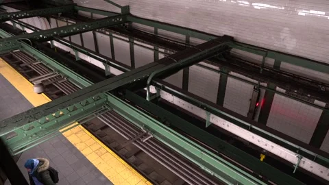 Subway rolling through exit in New York City above angle Stock Footage 248477324