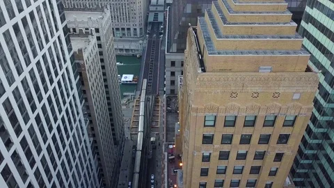 Subway Rounds the Chicago Loop - 4k Aerial Video stock 104357088