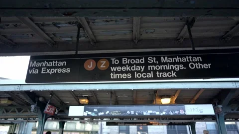 Subway sign on Elevated Subway Station. Manhattan via Express JZ Subway Train Video stock 199989993