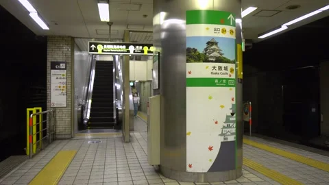 Subway Station Exit And Advertisements Towards Osaka Castle in Osaka, Japan Stock Footage 264172248
