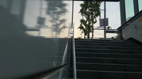 Subway Station Exit Staircase Reflection at Sunset, Vertical Stock Footage 339286724