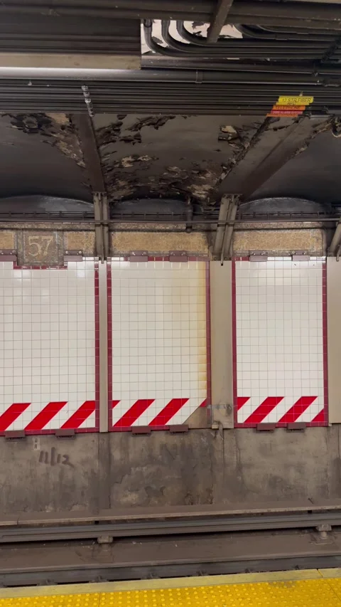 Subway Station Wall and Tracks with Tiled Panels Stock Footage 344593593