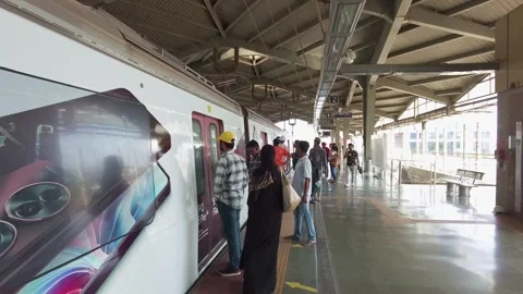 A subway train arrives at platform of the metro station Stock Footage 313214357