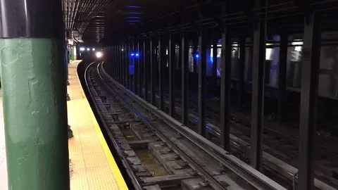 Subway Train arriving at Columbus Circle / 59th St  - #1 Downtown_01 Stock Footage 107754903