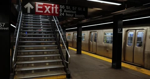 Subway train arriving at an empty 57th street station in New York Stockbeeldmateriaal 237016584