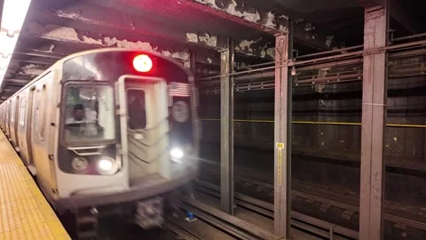Subway Train Arriving at Station in New York City Stock Footage 279291900