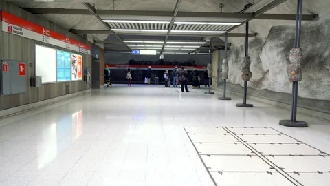 Subway train arriving to the underground platform station in Helsinki with Stock Footage 73823377
