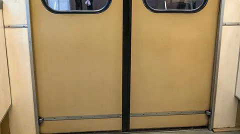 Subway train with closed doors on platform. Metal doors on the train. Wagons  Stock Photos
