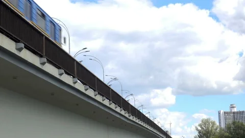 The subway train crosses the bridge at 4K. Stock Footage 137491288