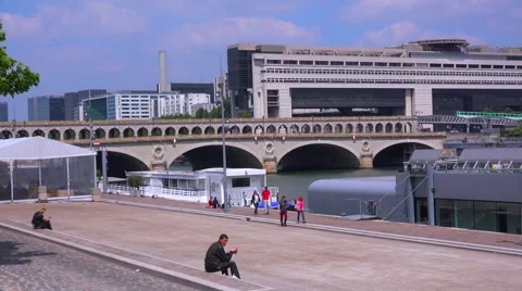 A subway train crosses a bridge in Paris. Stock Footage 41579524